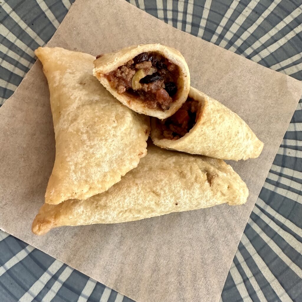 Recipes to Pair with Cain Cuvée: Picadillo Empanadas