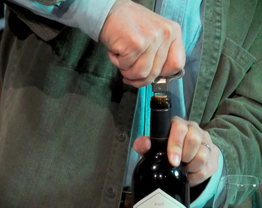 Chris Howell of Cain Vineyard & Winery demonstrates how to use an Ah-So to open a bottle of wine